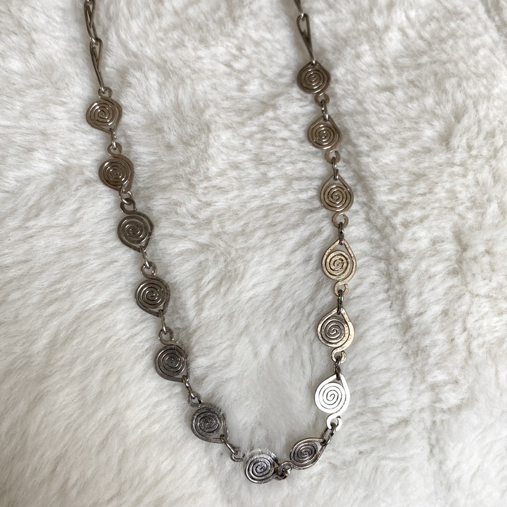 Silver swirls design necklace